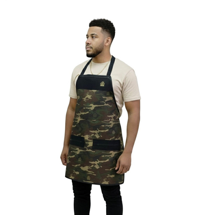 Man wearing a camouflage apron on a white background