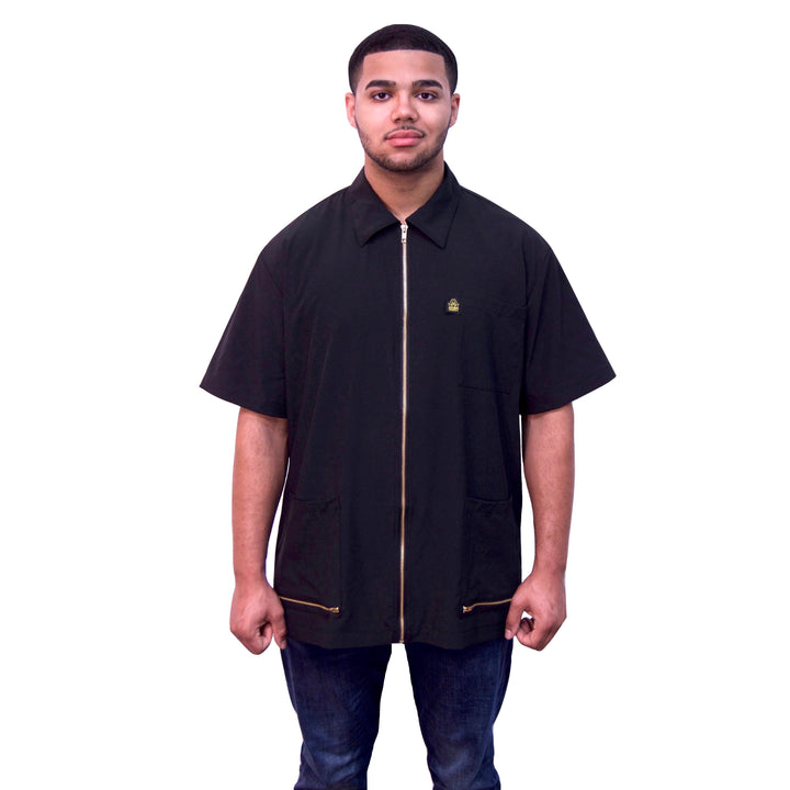 Black barber jacket with front zipper.