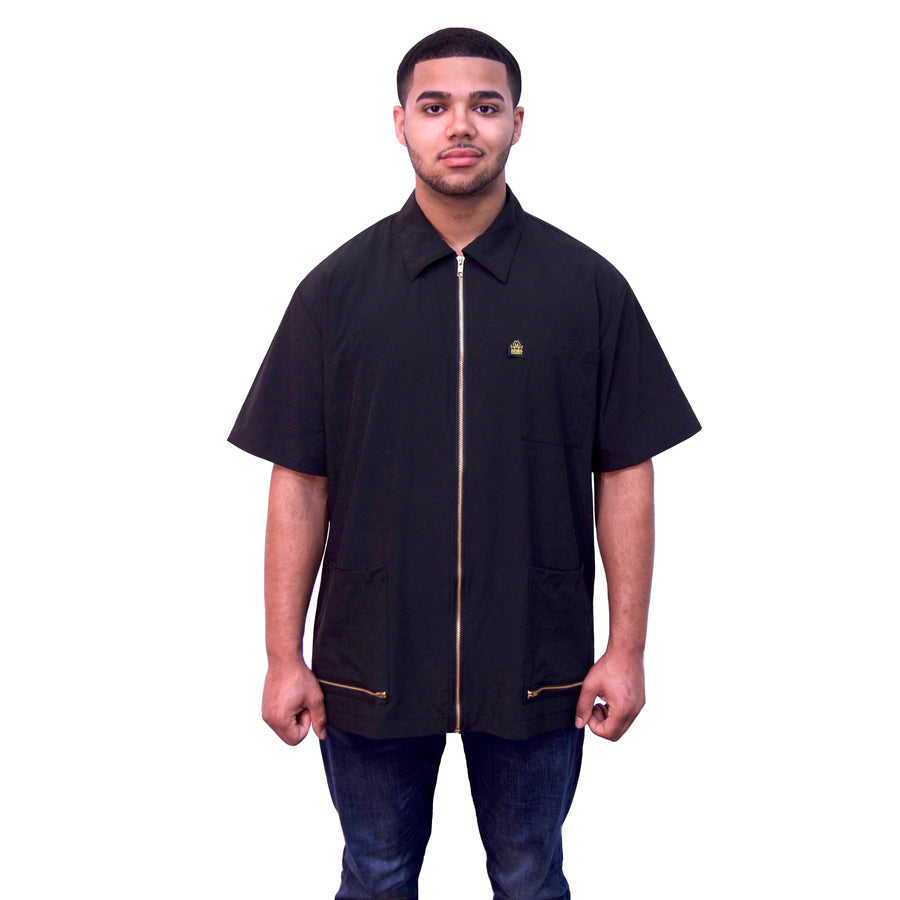 Black barber jacket with front zipper.