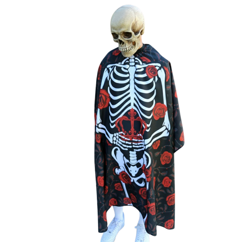 Skeletal design barber cape with red roses on a black background.
Skeleton barber cape- skeleton pro cape - skeleton cape -  barber cape skeleton - halloween barber cape