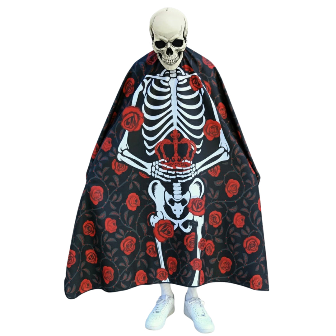 Skeleton design barber cape with red roses on a black background.
Skeleton barber cape- skeleton pro cape - skeleton cape -  barber cape skeleton - halloween barber cape