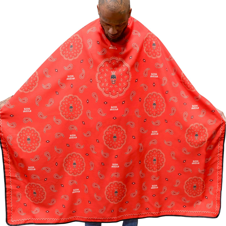 red bandana barber cape -barber cape- hair stylist capes- styling cape - salon capes -barber capes -hair cutting cape- hair cutting capes for men- barber cape for men - King Midas cape- barbershop cape -professional barber cape with snap buttons- hair styling cape -Styling cape- snap button capes- best barber capes-  barber capes with designs- barber smocks and capes - barber capes for sale- barber supplies -King Midas capes